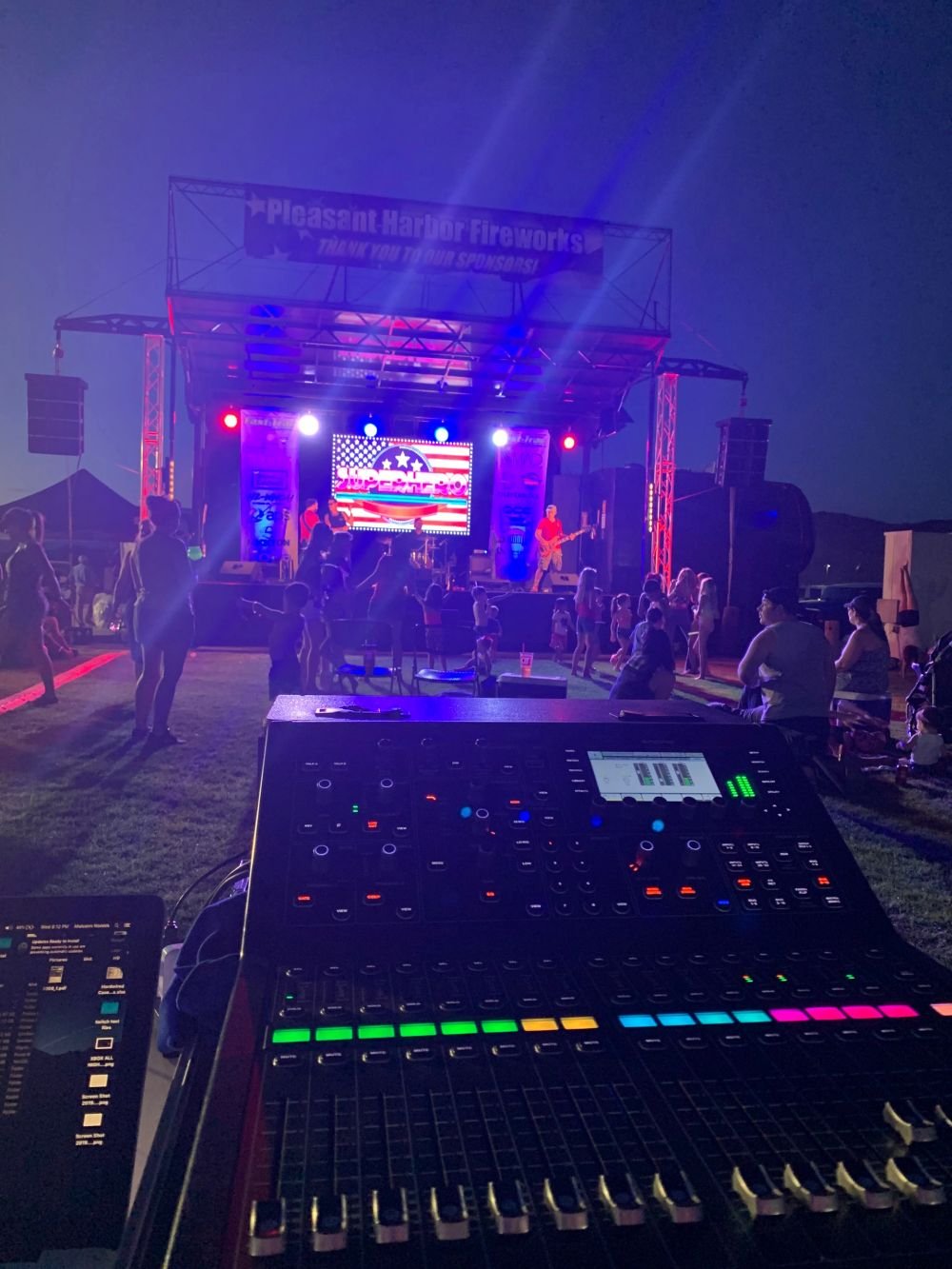 Stage production with LED wall and moving lights